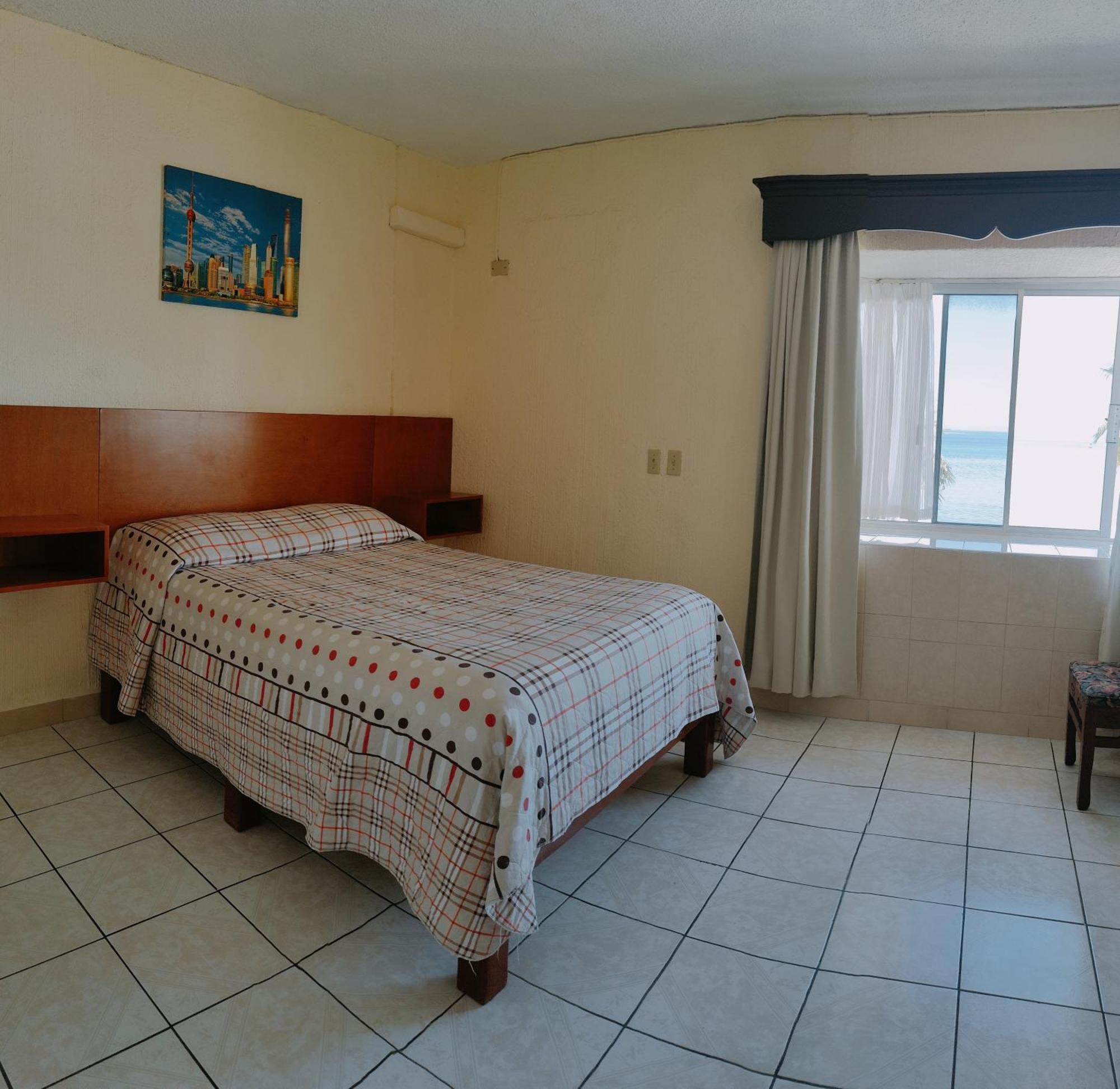 Hotel Pekin La Paz Pokoj fotografie